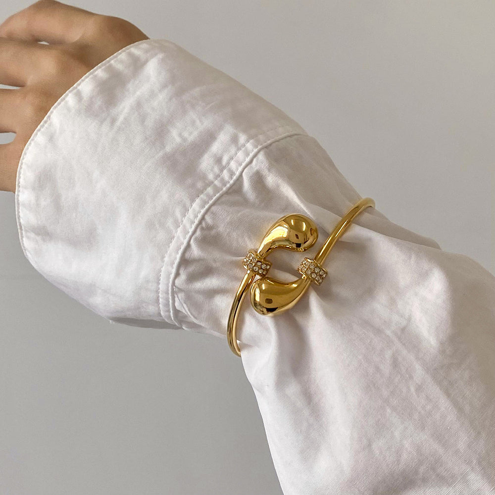Razare Bracelet Teesta Gold Plated Open Cuff Bracelet for Women | Elegant Knot Design Kada Bangle with Zircon Accents | Minimal Luxury Wrist Jewelry