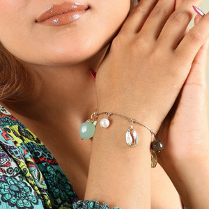 Razare Braclet Blue & White Stone Charm Bracelet: 18K Gold Plated